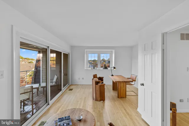 a view of a living room and dining room
