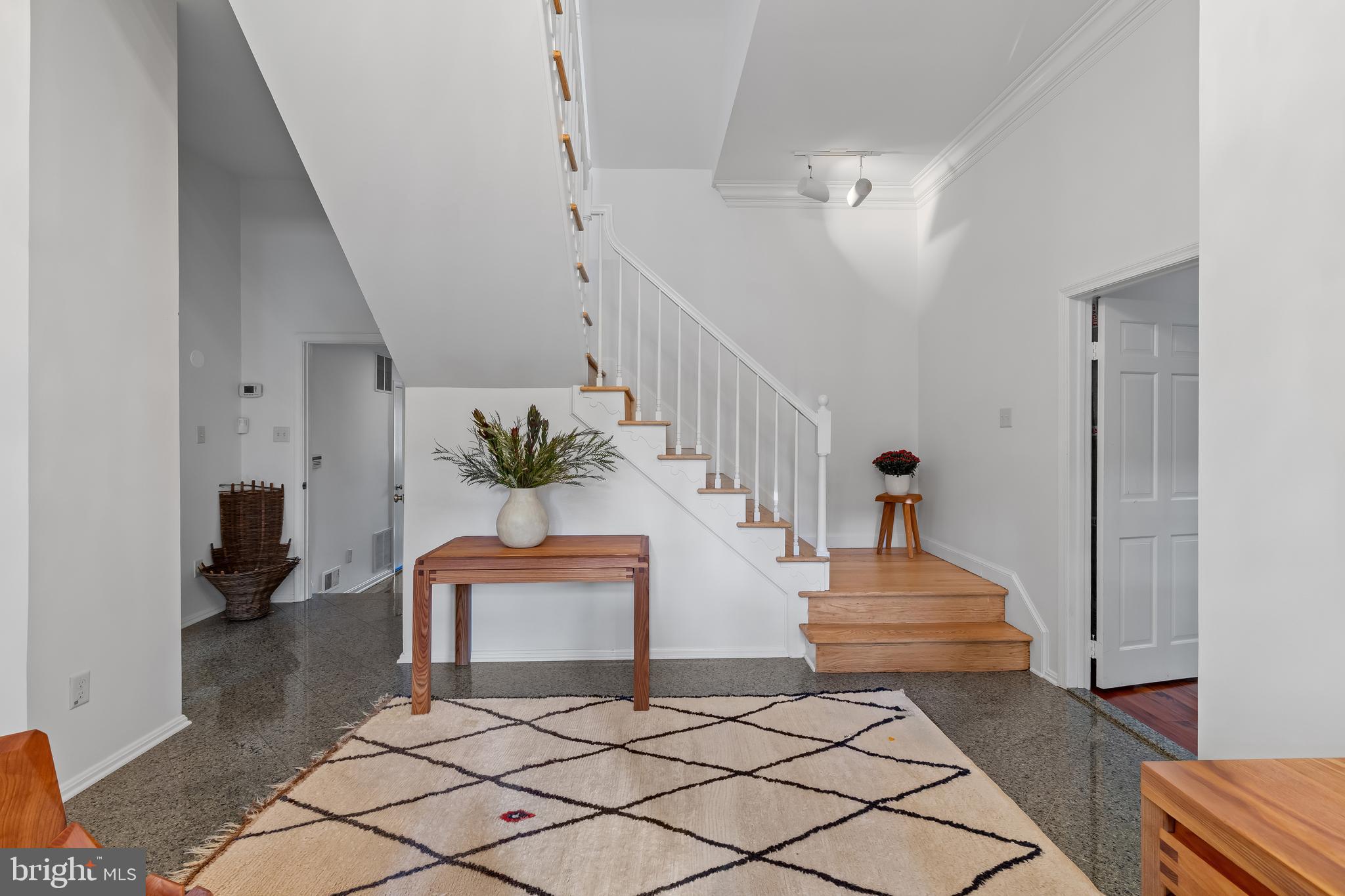 2 Southgate Avenue, Unit 10 Annapolis, MD 21401 - Photo 6 of 41 a living room with furniture and a stairs