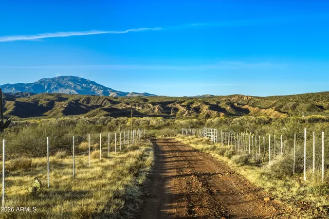 a view of lake with mountain