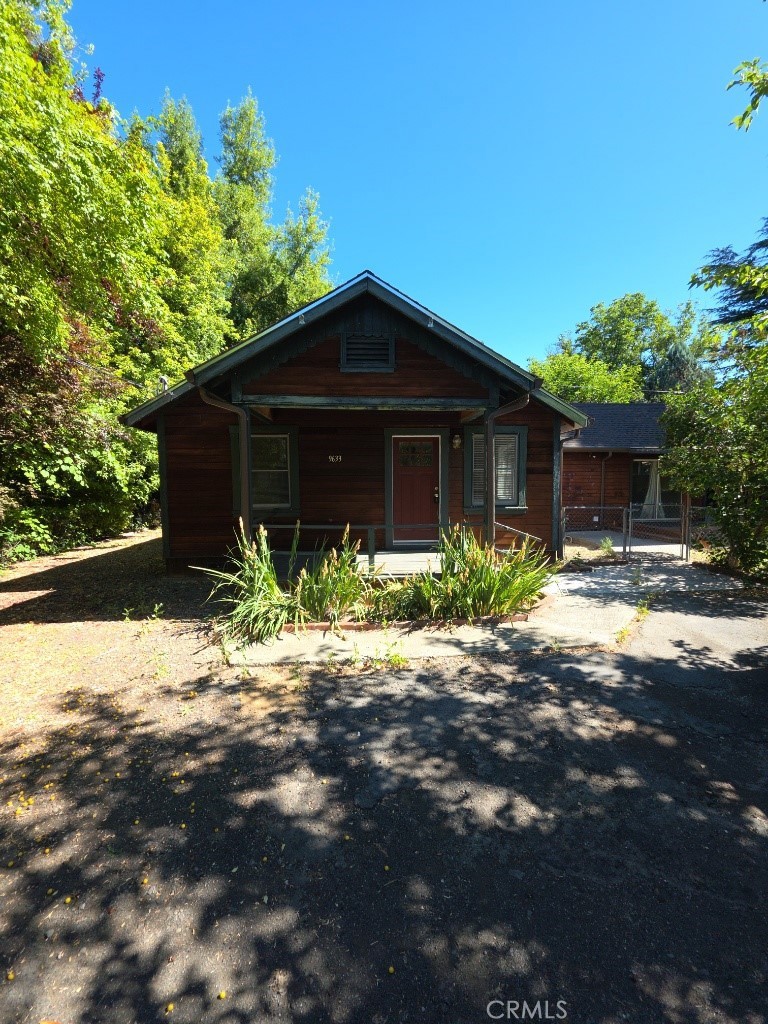 9633 Middle Creek Road Upper Lake, CA 95485 - Photo 1 of 18 a front view of a house with a yard