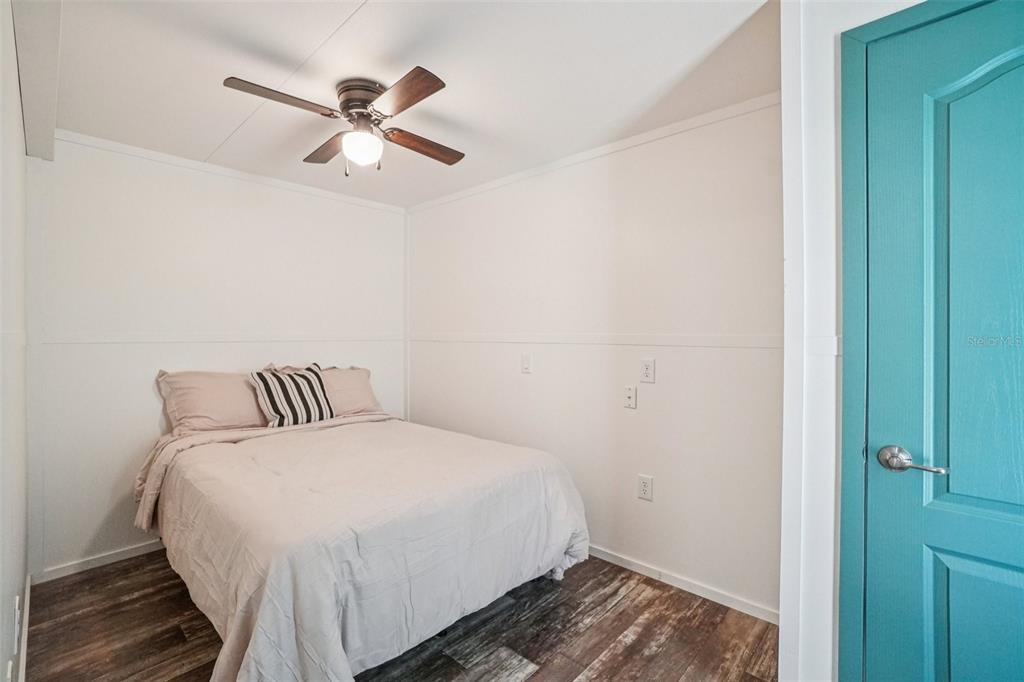 808 Southwest 124th Lane Webster, FL 33597 - Photo 12 of 18 a bedroom with a bed and cabinets