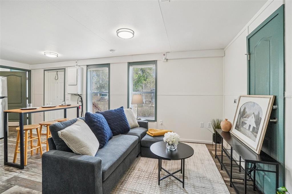 808 Southwest 124th Lane Webster, FL 33597 - Photo 4 of 18 a living room with furniture and a window