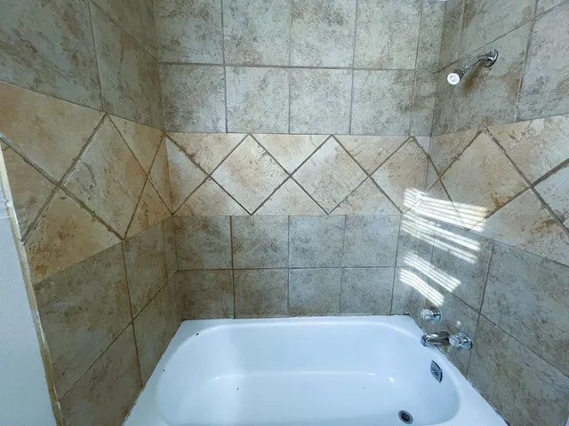 a bathroom with a bathtub