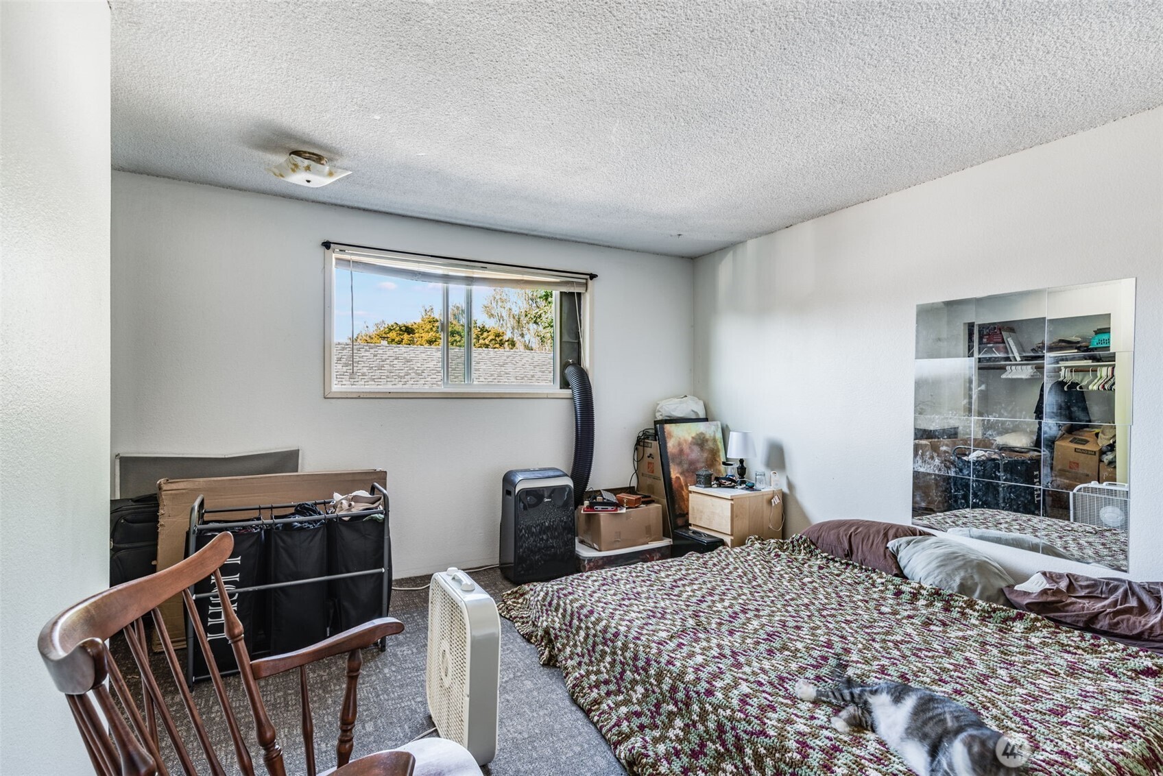 1602 Delaware Street Longview, WA 98632 - Photo 22 of 40 a bedroom with bed and wooden floor