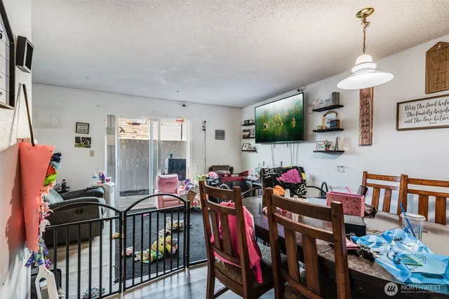 a group of people sitting in a living room