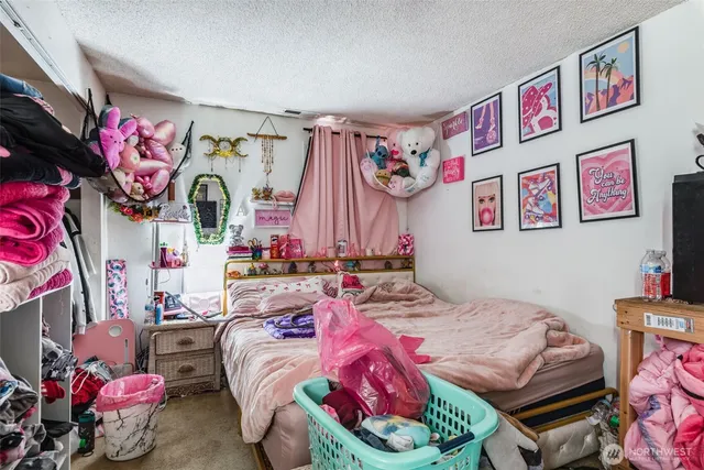 a bed room with a bed and a couch