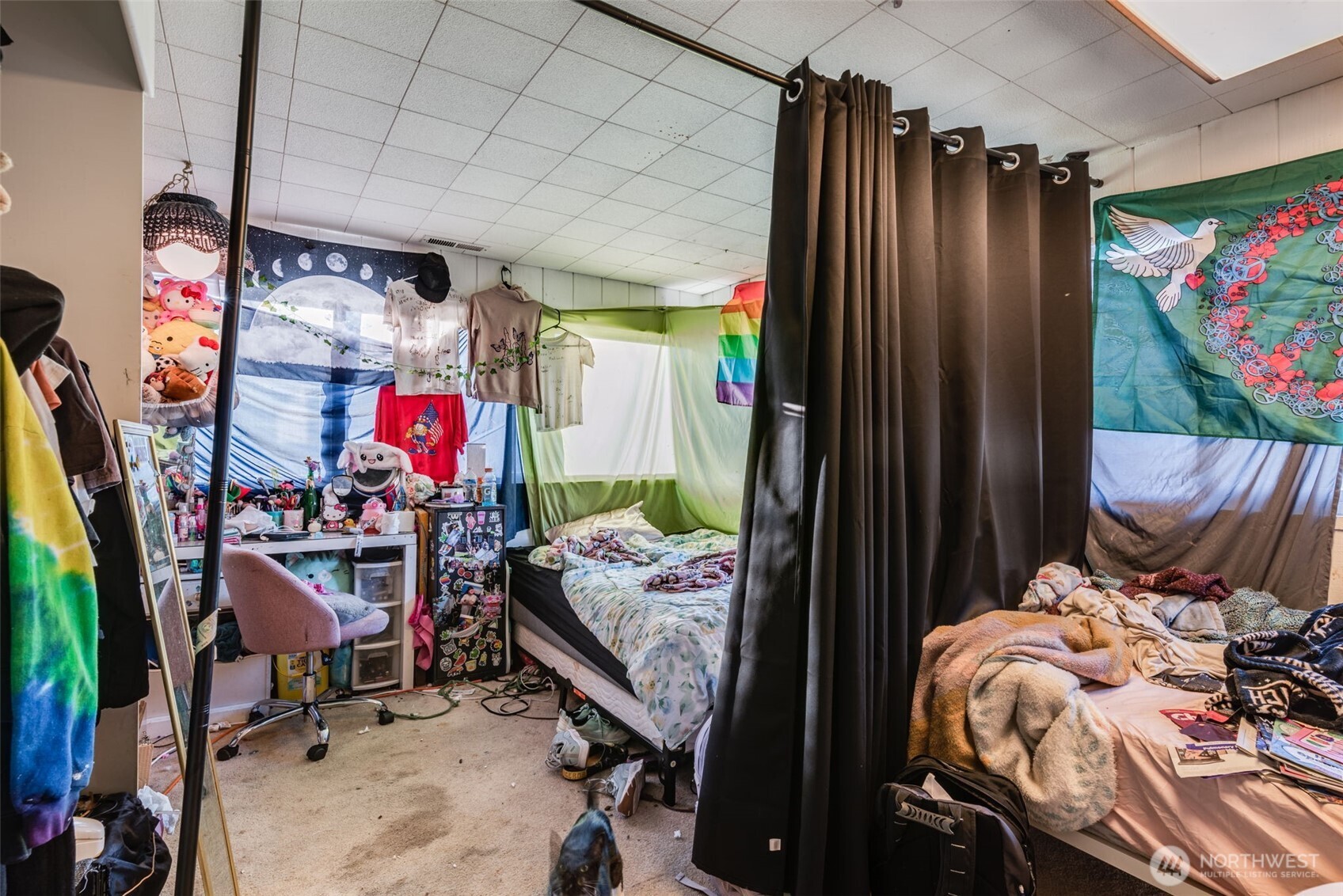 1602 Delaware Street Longview, WA 98632 - Photo 30 of 40 a view of walk in closet with clothes and shoes