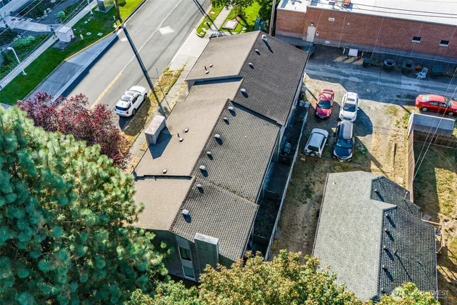 an aerial view of residential building with parking space