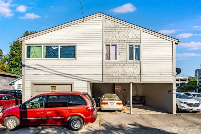 a car parked in front of a house