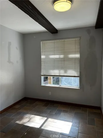 a bathroom with a toilet and a sink