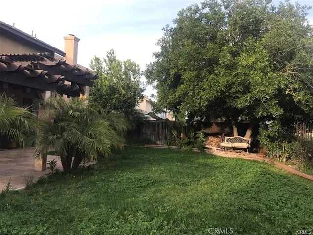 a view of a house with a garden