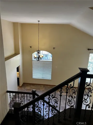 a view of room with wooden floor