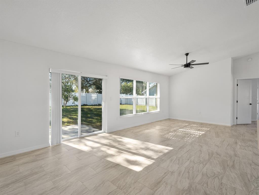 3215 Colusa Street Deltona, FL 32738 - Photo 12 of 32 a view of an empty room with a window