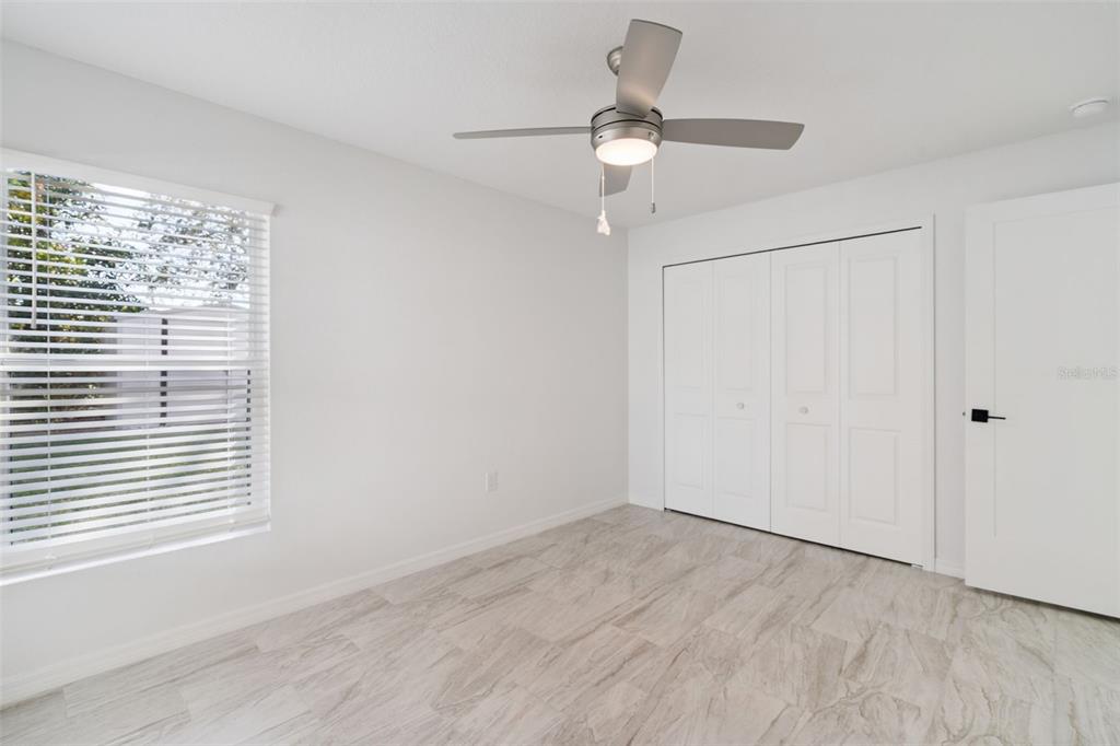 3215 Colusa Street Deltona, FL 32738 - Photo 26 of 32 a view of an empty room with a window
