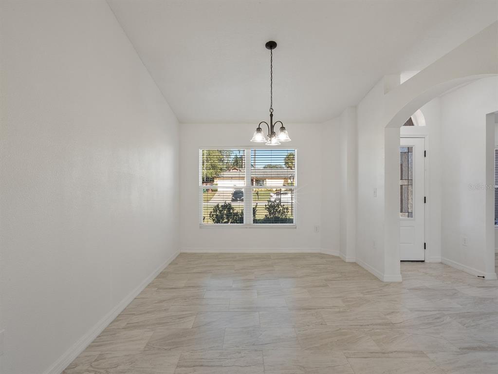 3215 Colusa Street Deltona, FL 32738 - Photo 5 of 32 a view of an empty room and window
