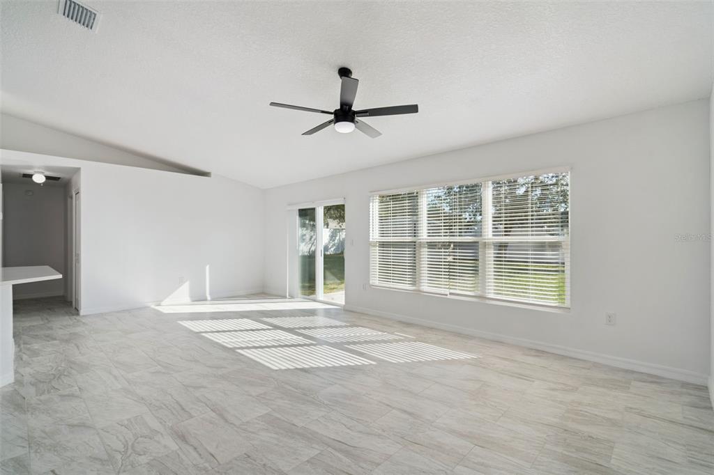3215 Colusa Street Deltona, FL 32738 - Photo 10 of 32 a view of an empty room with a window