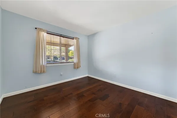 a hallway with wooden floor