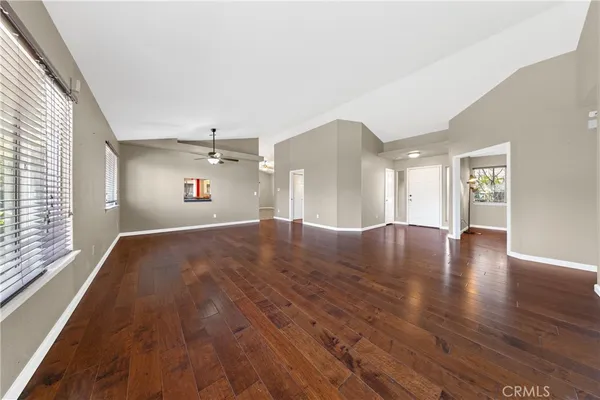 a view of livingroom and hardwood floor