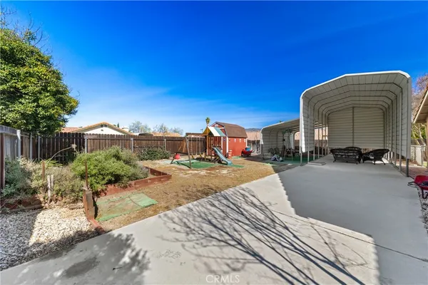 an aerial view of residential houses and outdoor space