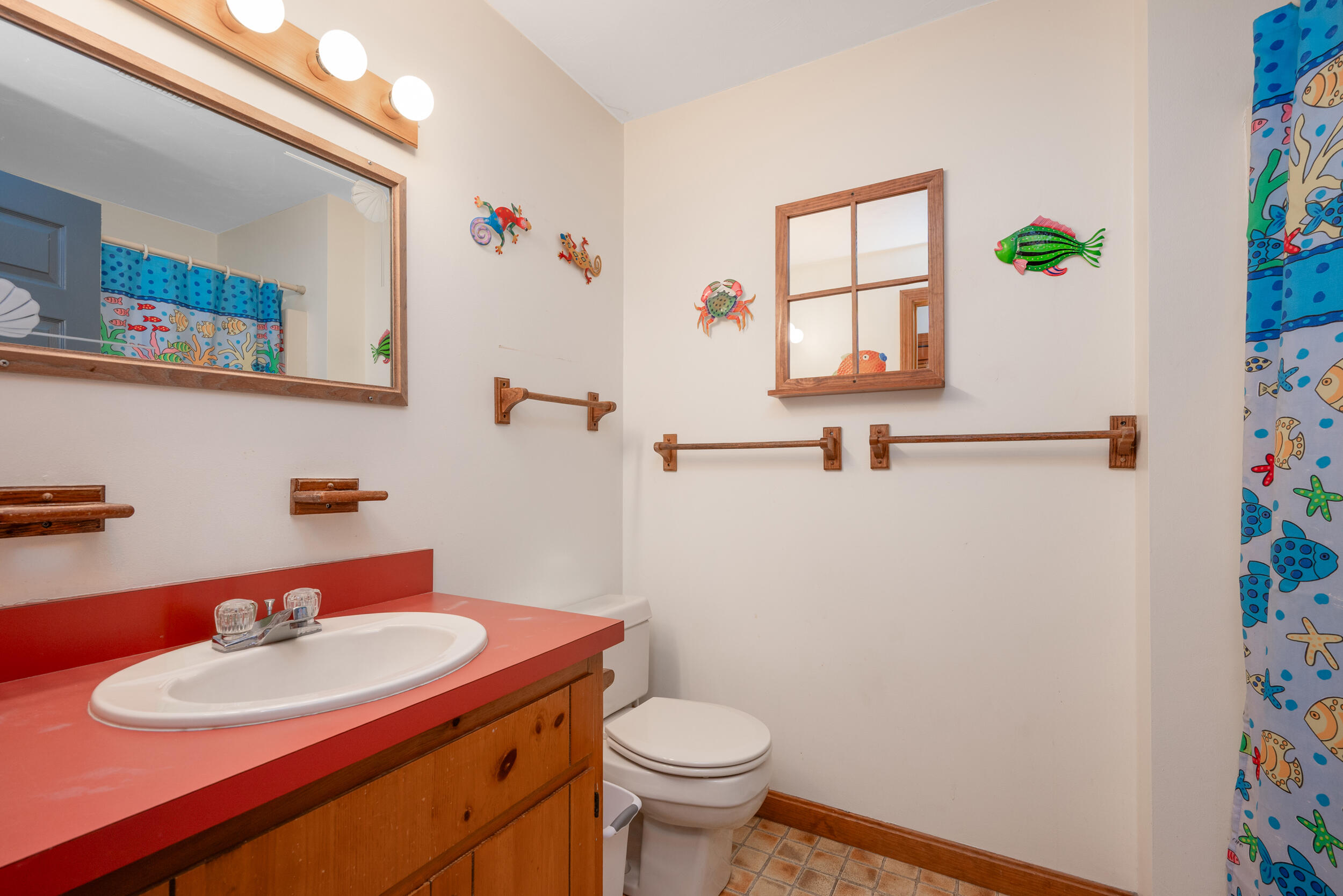 5 Blueberry Island Road Orleans, MA 02653 - Photo 16 of 39 a bathroom with a sink toilet and mirror