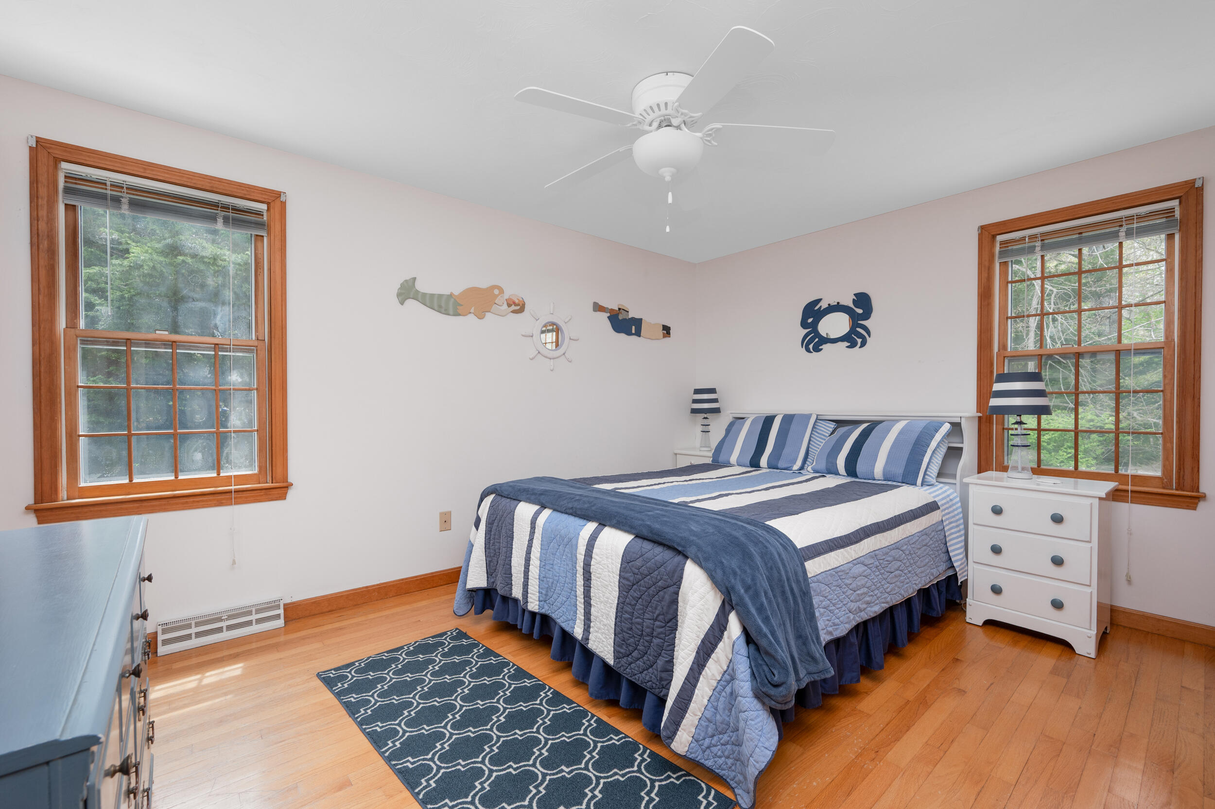 5 Blueberry Island Road Orleans, MA 02653 - Photo 21 of 39 a bedroom with a bed and a window