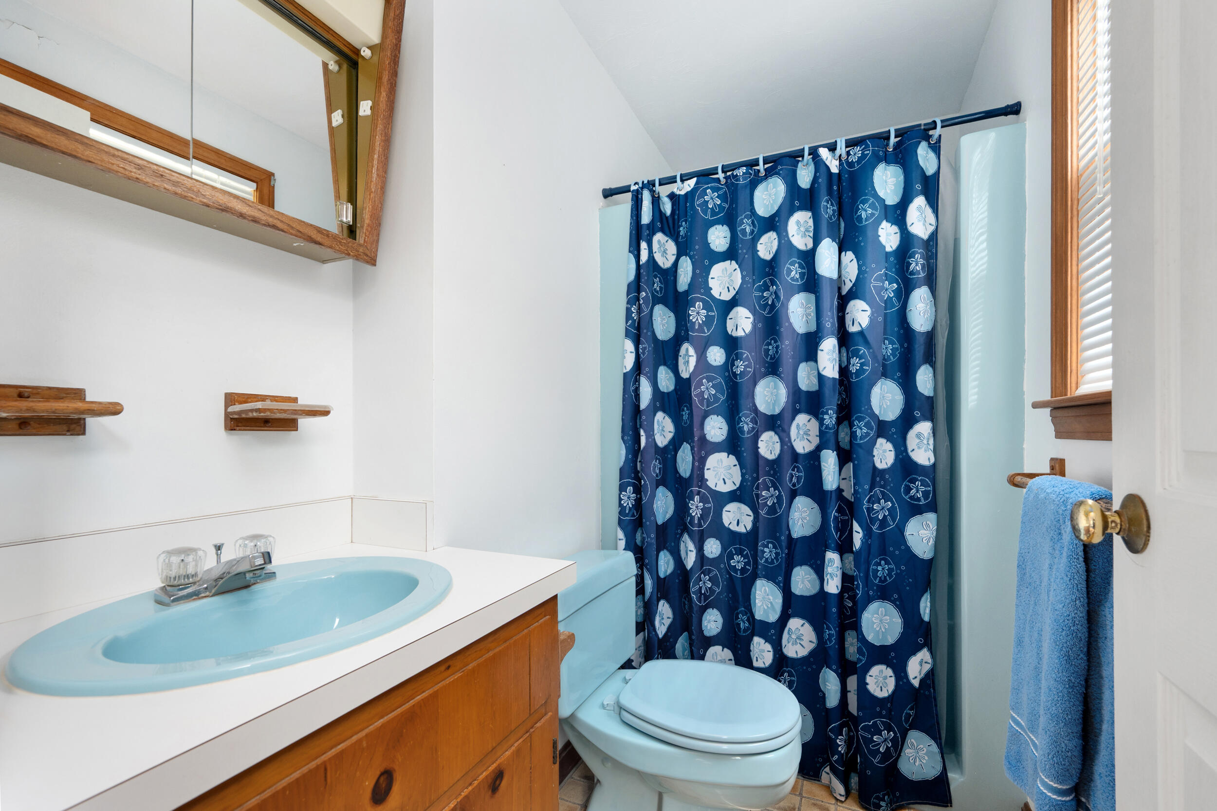 5 Blueberry Island Road Orleans, MA 02653 - Photo 23 of 39 a bathroom with a sink toilet and shower
