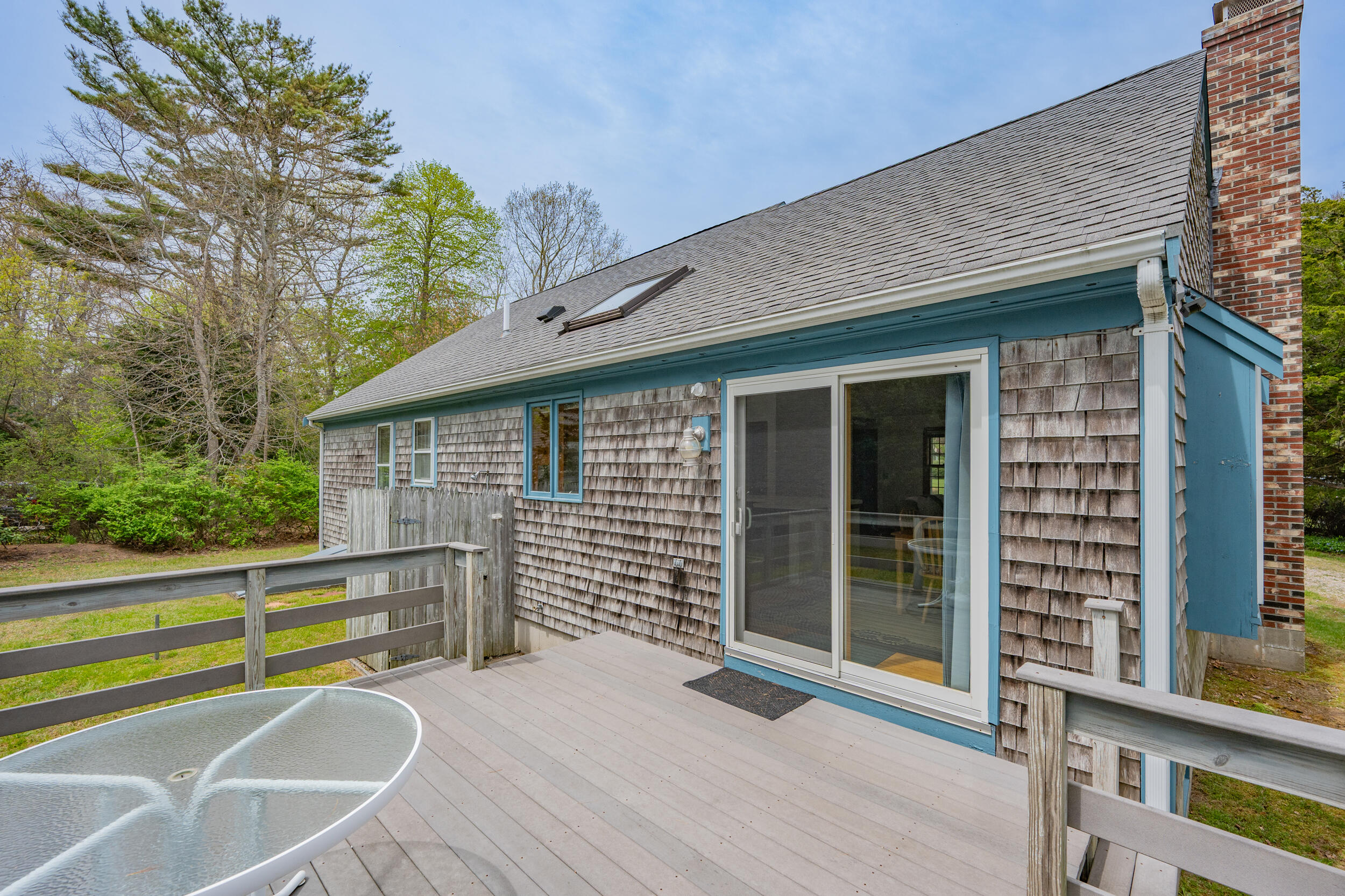 5 Blueberry Island Road Orleans, MA 02653 - Photo 27 of 39 a view of a house with a wooden fence