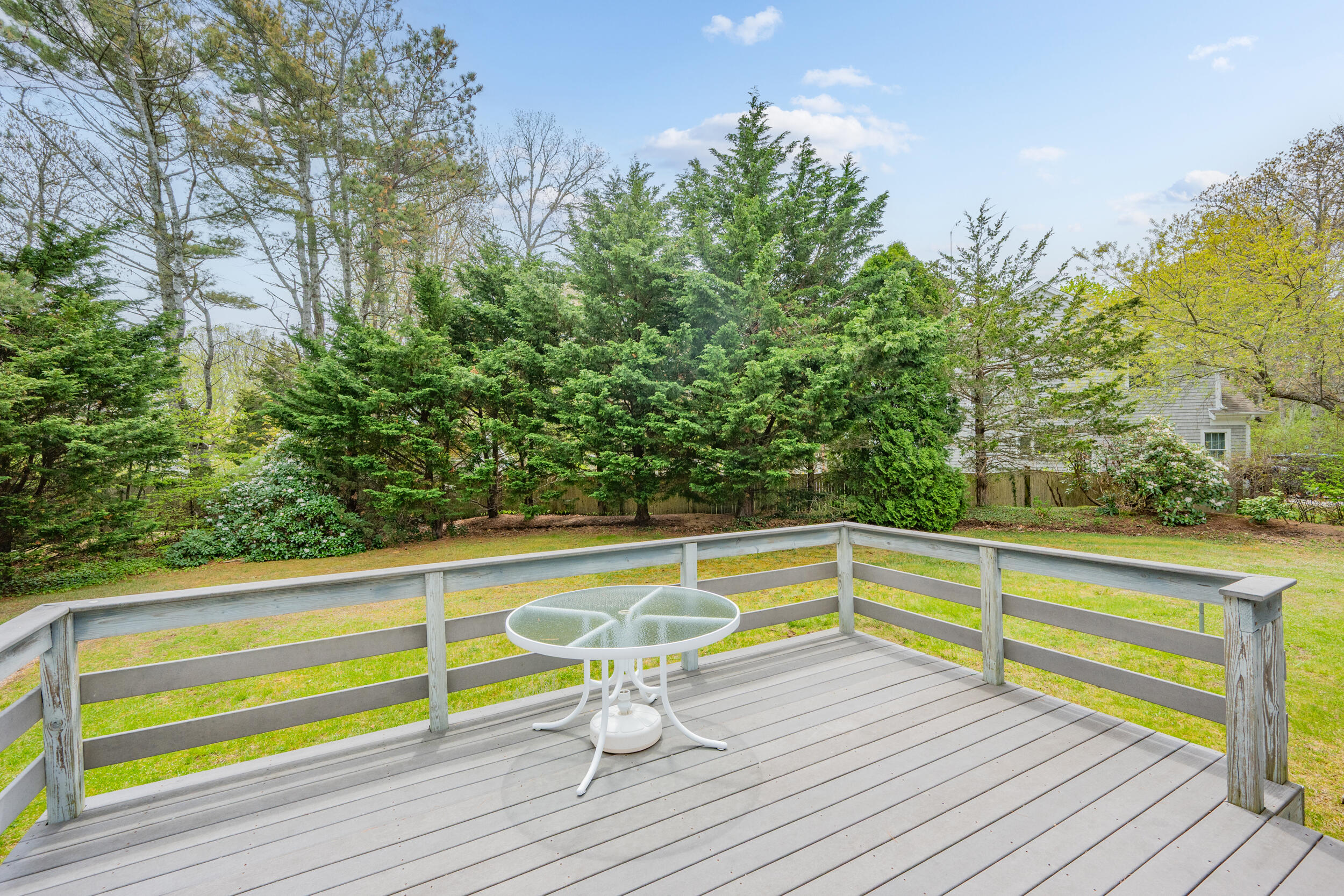 5 Blueberry Island Road Orleans, MA 02653 - Photo 28 of 39 a view of a chairs and table on the wooden floor