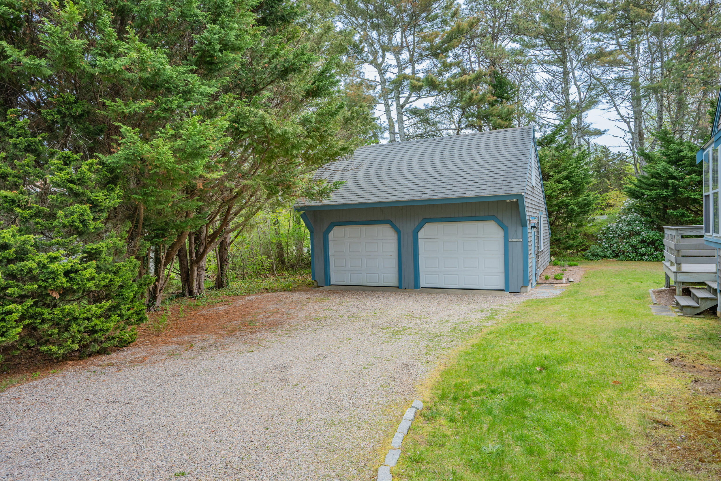5 Blueberry Island Road Orleans, MA 02653 - Photo 30 of 39 a house with trees in front of it