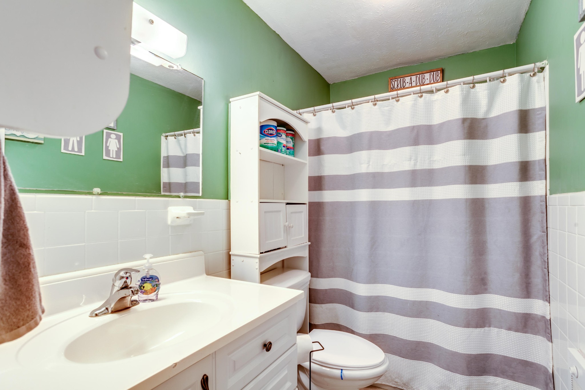 1283 Laurel Road Clinton, TN 37716 - Photo 16 of 29 a bathroom with a sink a toilet and shower