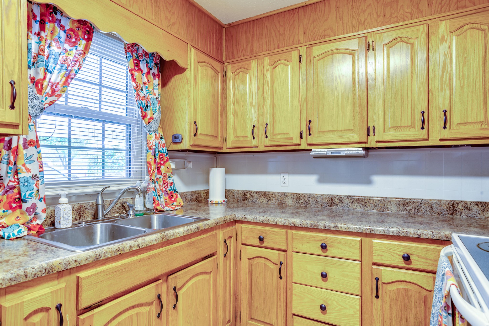 1283 Laurel Road Clinton, TN 37716 - Photo 5 of 29 a kitchen with granite countertop a sink and a window