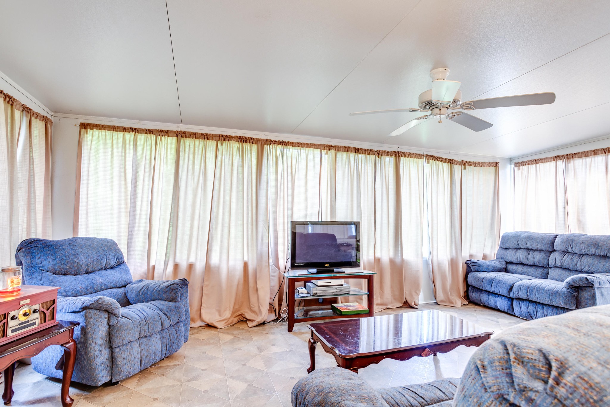 1283 Laurel Road Clinton, TN 37716 - Photo 9 of 29 a living room with furniture a large window and a rug