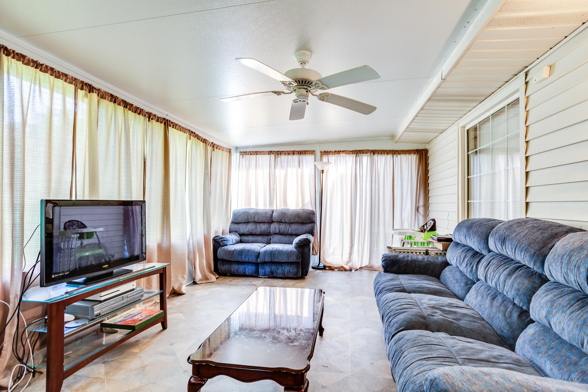 1283 Laurel Road Clinton, TN 37716 - Photo 10 of 29 a living room with furniture and a flat screen tv