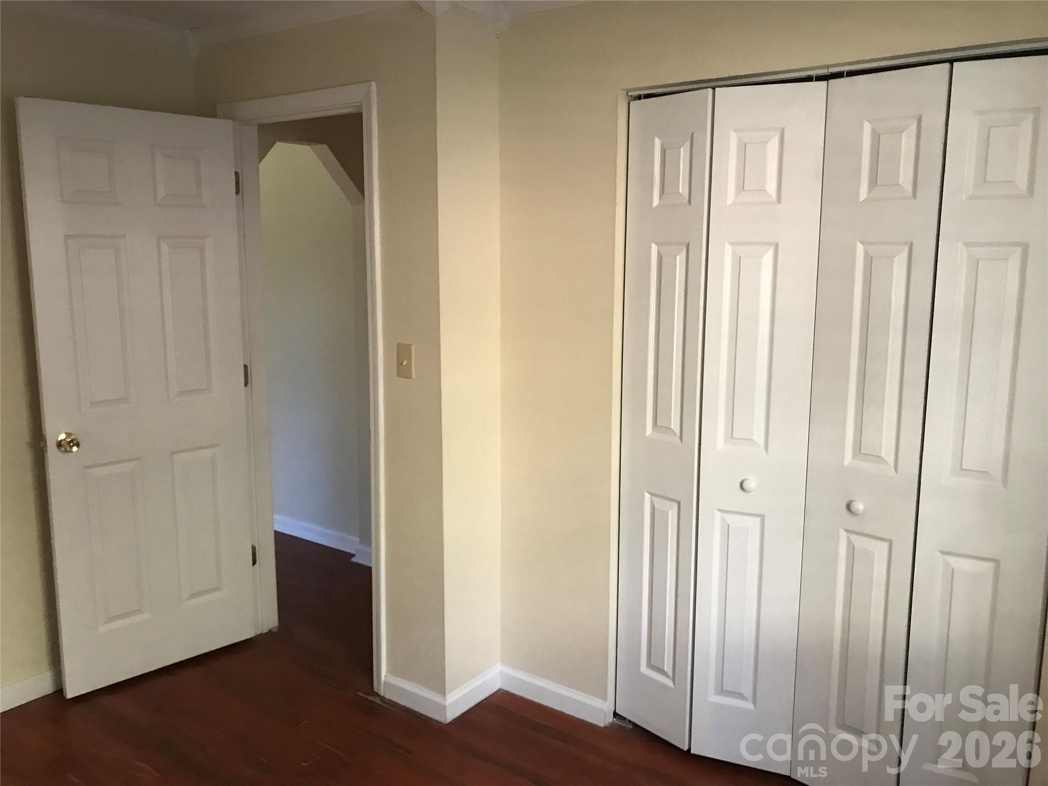 545 Avery Creek Road Arden, NC 28704 - Photo 11 of 35 a view of front door with wooden floor