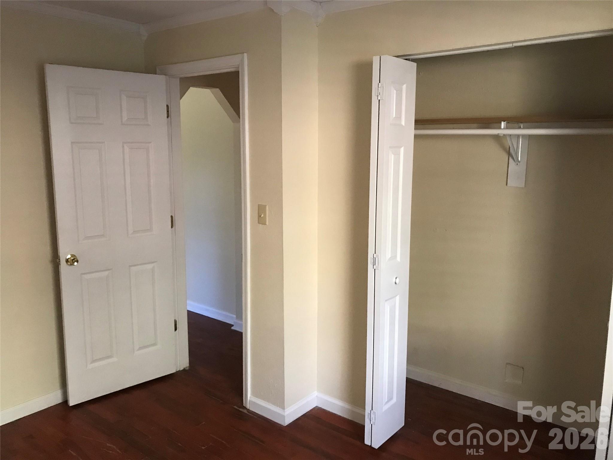 545 Avery Creek Road Arden, NC 28704 - Photo 12 of 35 a view of empty room with wooden floor