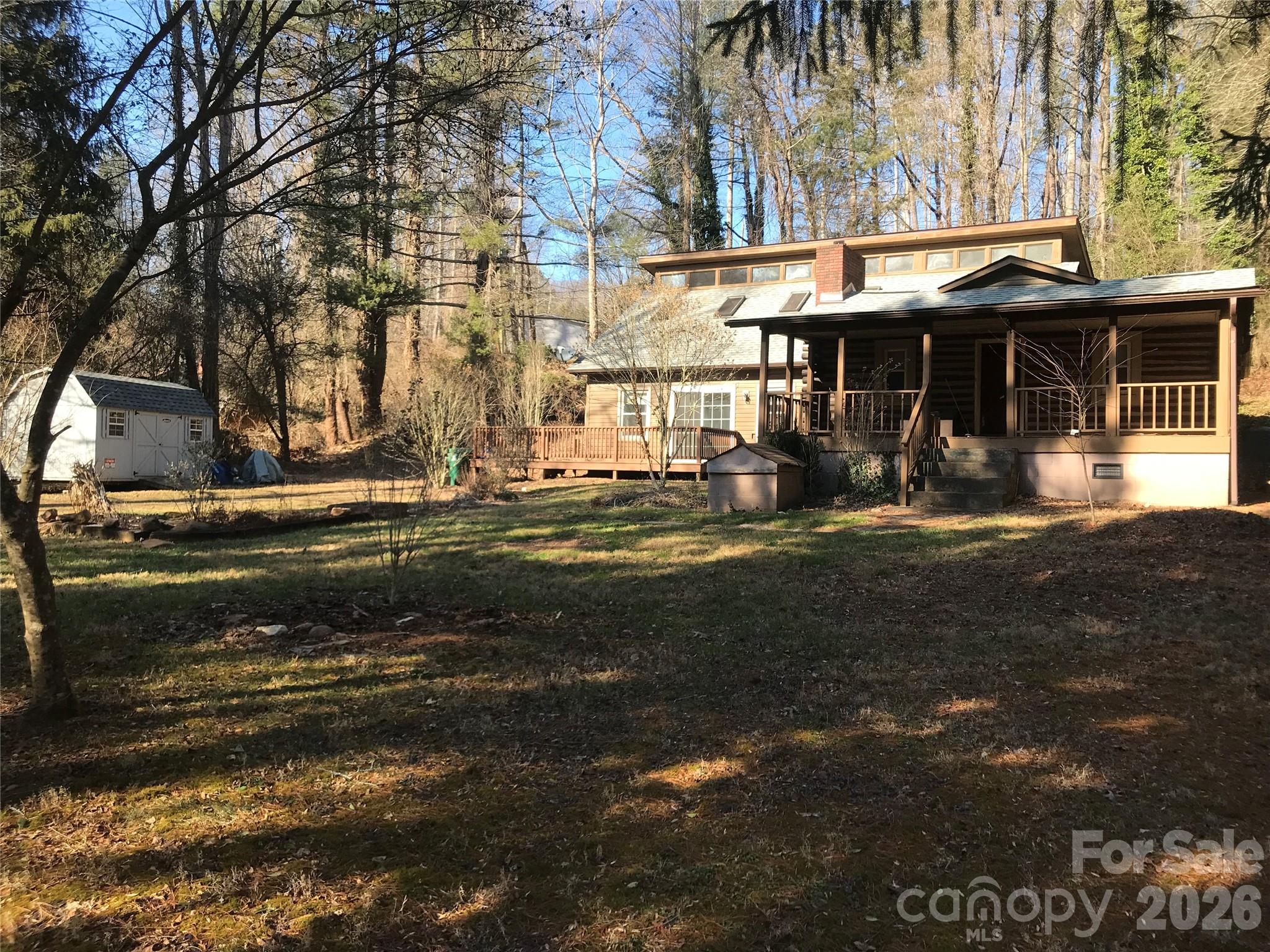 545 Avery Creek Road Arden, NC 28704 - Photo 2 of 35 a view of a house with a yard