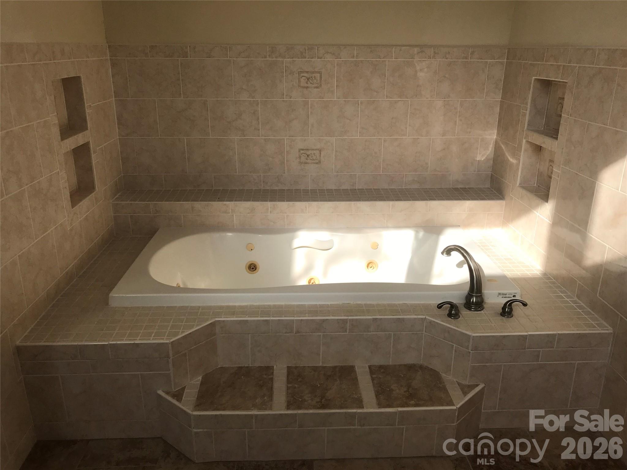 545 Avery Creek Road Arden, NC 28704 - Photo 28 of 35 a close view of sink and tap