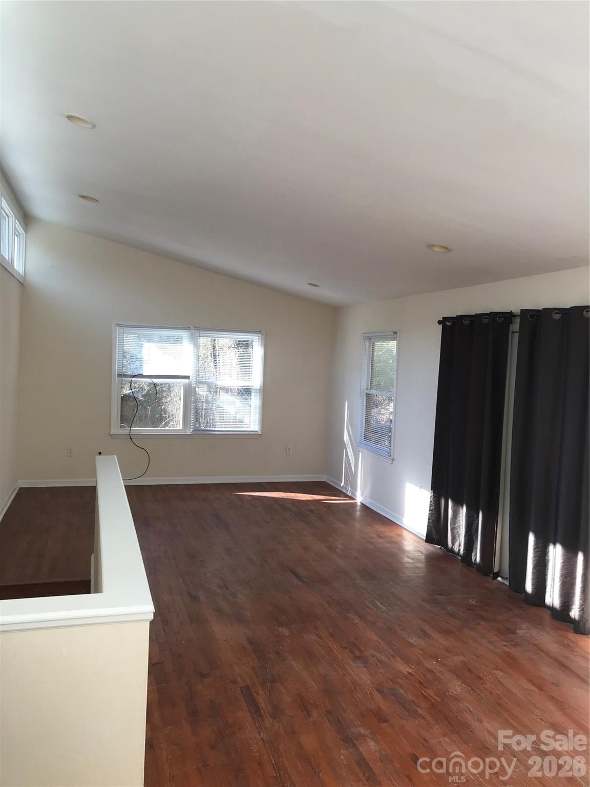 545 Avery Creek Road Arden, NC 28704 - Photo 29 of 35 a view of a livingroom with wooden floor