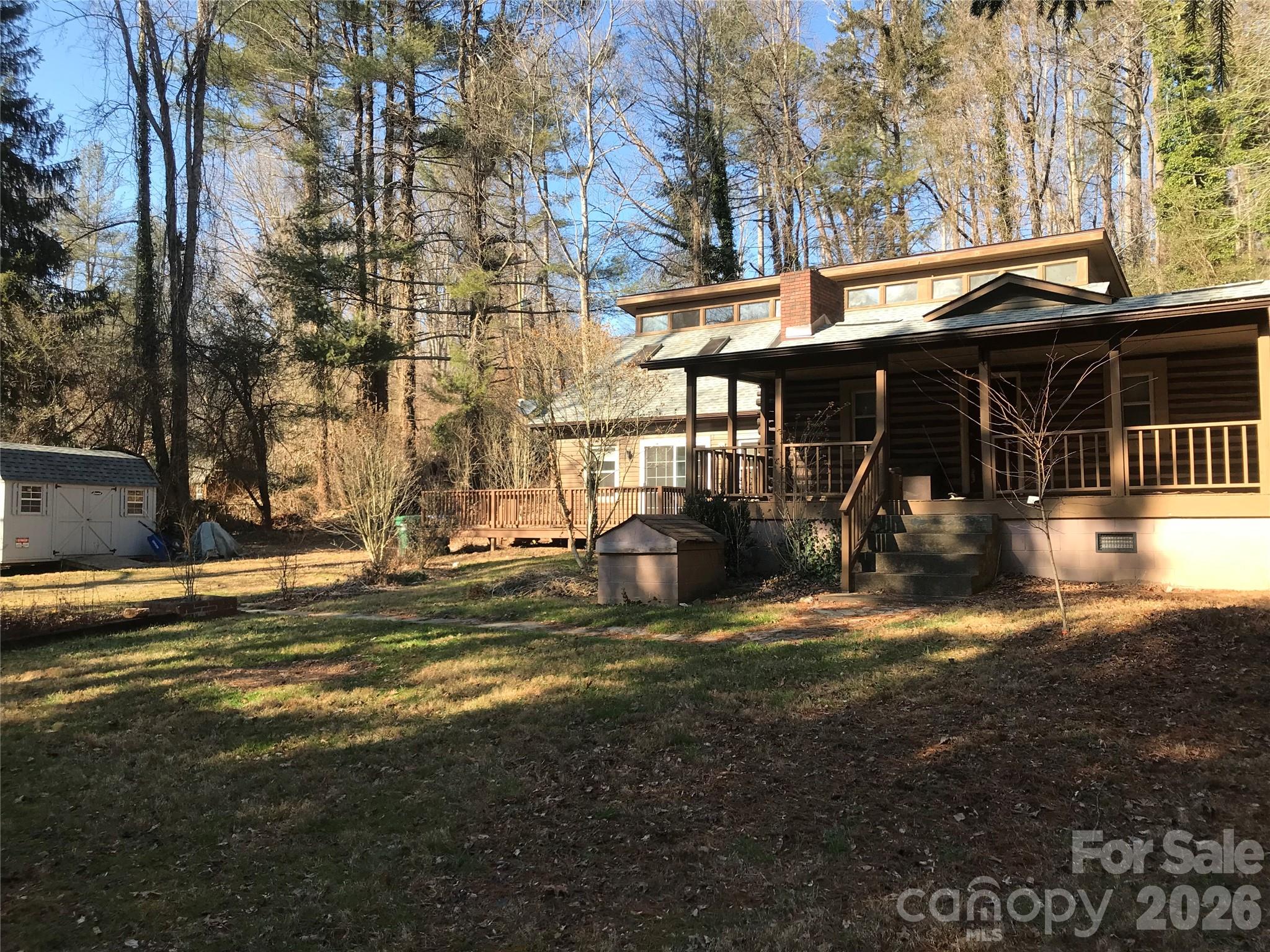 545 Avery Creek Road Arden, NC 28704 - Photo 3 of 35 a view of a house with backyard