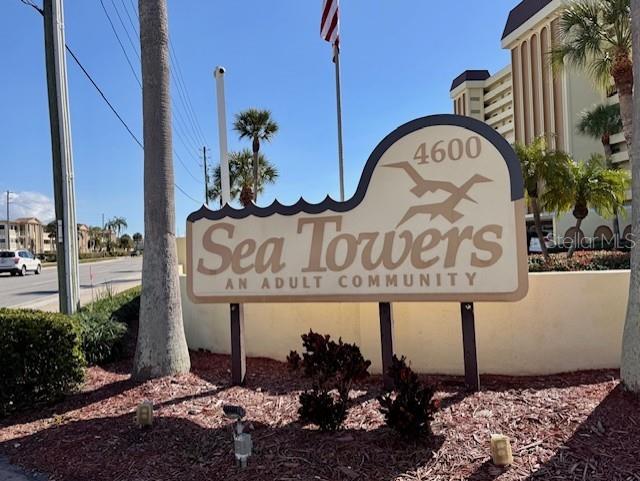 4775 Cove Circle, Unit 1105 St. Petersburg, FL 33708 - Photo 25 of 40 a front view of a building with garden