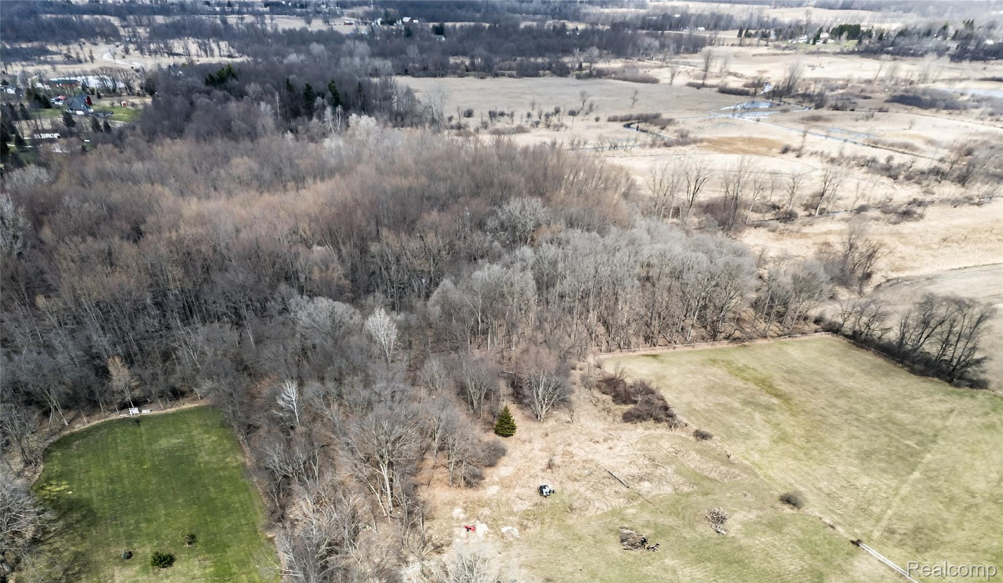5516 Lowe Road Fowlerville, MI 48836 - Photo 10 of 17 4-5516-Lowe-Rd-Fowlerville-MI-48836-WindowStill.jpg