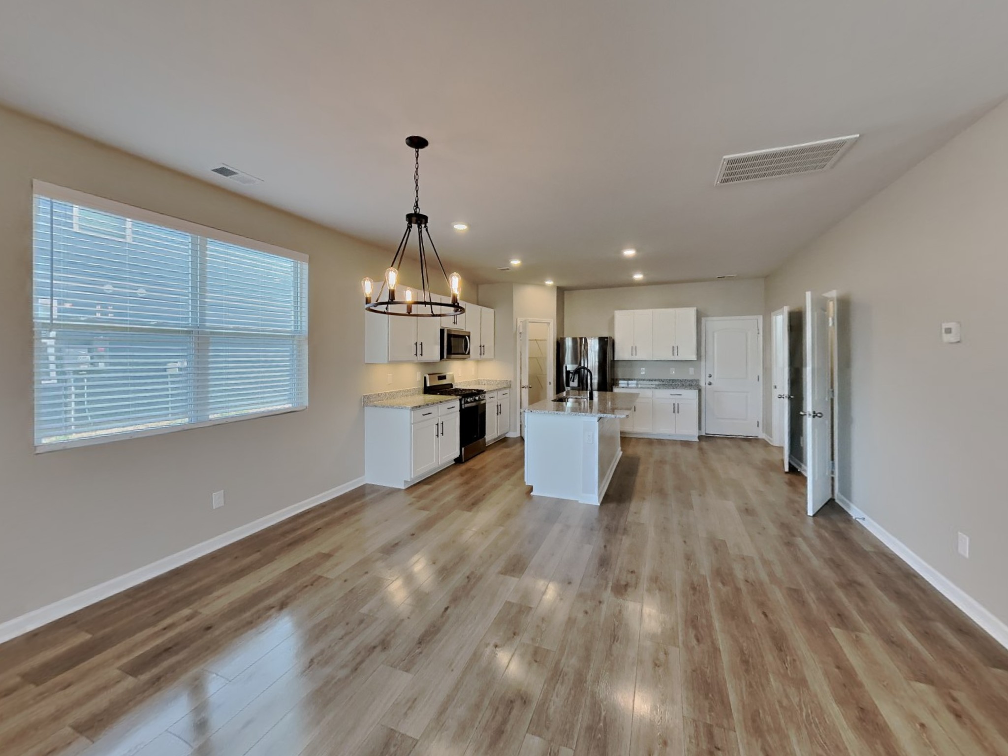 1406 Ashfield Place Lebanon, TN 37087 - Photo 4 of 17 a view of kitchen with wooden floor