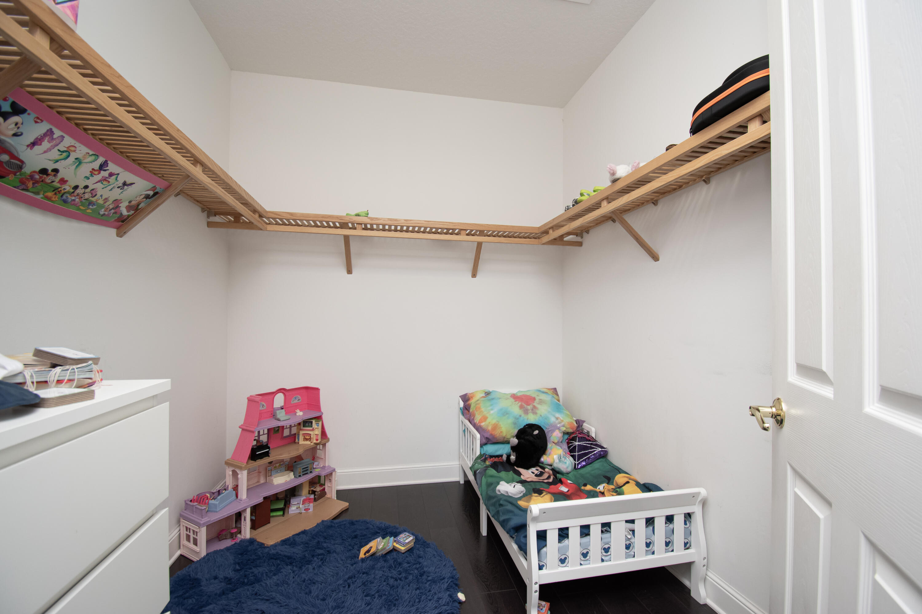 9851 Palma Vista Way Boca Raton, FL 33428 - Photo 22 of 33 a bed room with furniture and a window