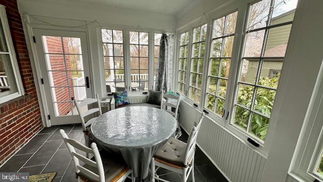 9102 Flower Avenue Silver Spring, MD 20901 - Photo 11 of 25 Bright sunroom with scenic views.