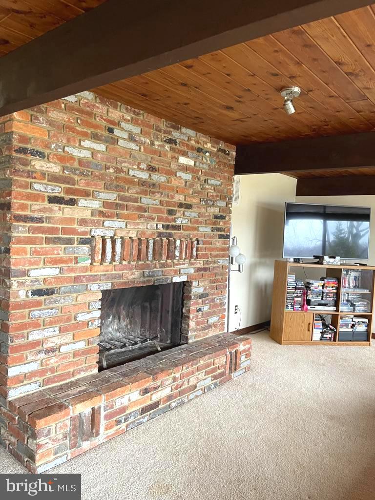 2724 Cedar Drive Riva, MD 21140 - Photo 15 of 24 Lower Lvl Brick Wood Burning Fireplace