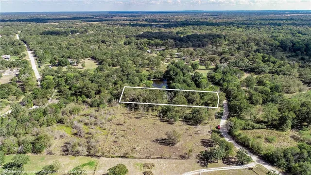 a view of a yard with street view