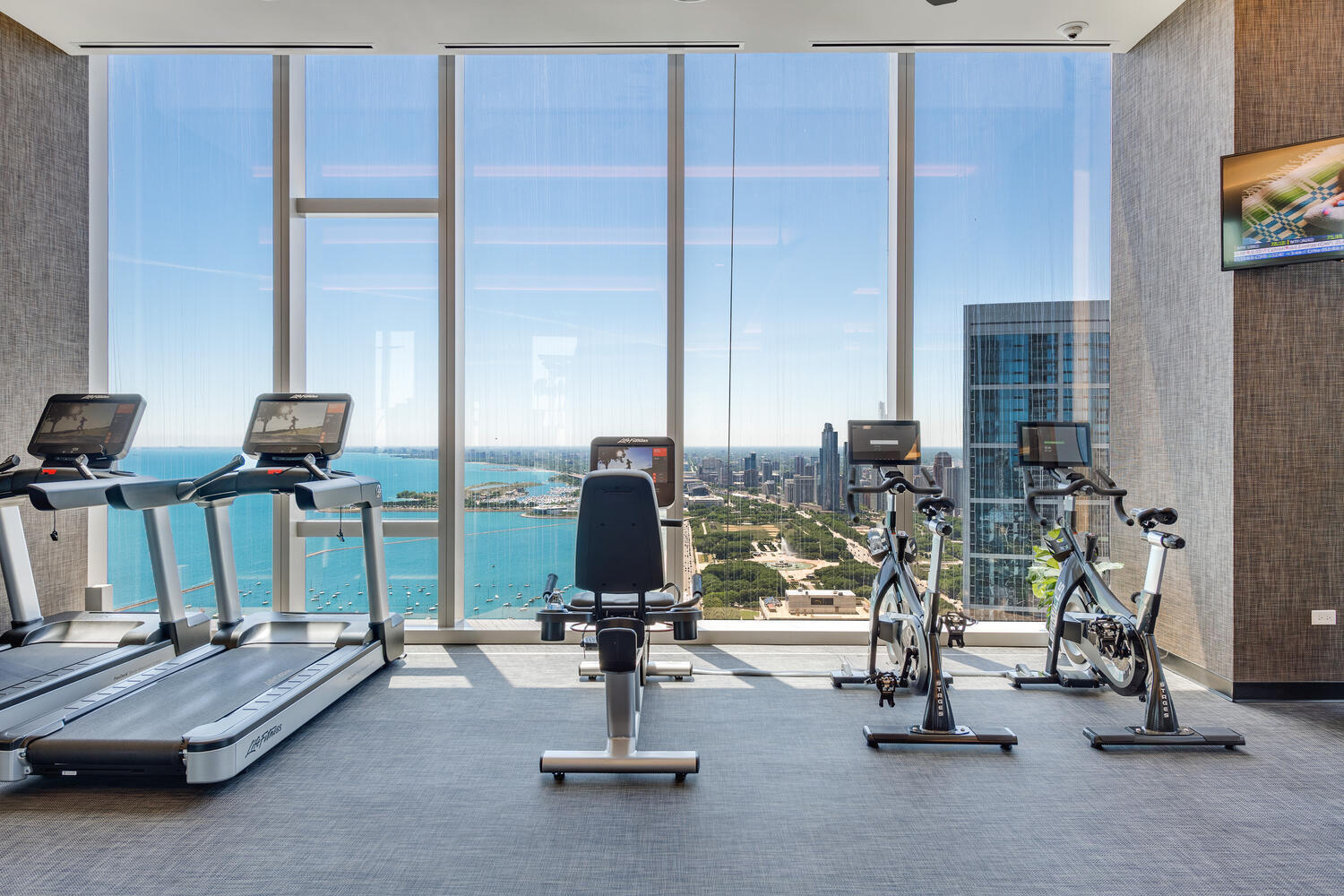 363 East Wacker Drive, Unit 2709 Chicago, IL 60601 - Photo 21 of 25 a view of a room with gym equipment