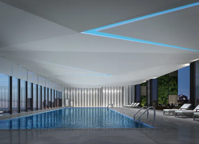 a view of a furniture and floor to ceiling window in an empty room