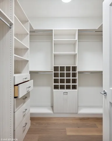a view of an empty walk in closet