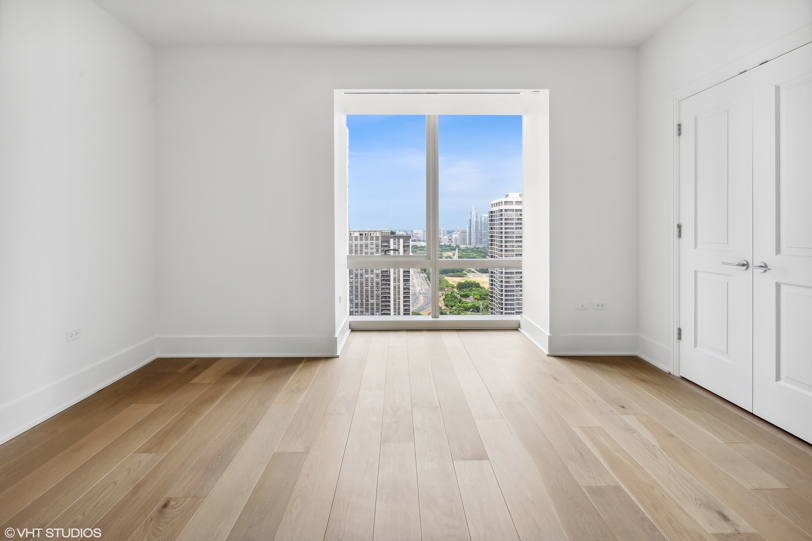 363 East Wacker Drive, Unit 2709 Chicago, IL 60601 - Photo 7 of 25 a view of an empty room and window
